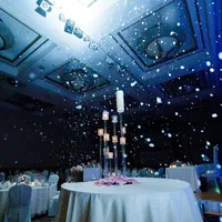 8mの天井高を誇る「阿蘇」の会場だから実現できるスノー演出はキャンドル点火のセレモニーをより幻想的に。