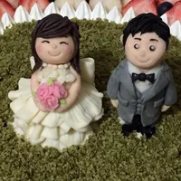 おふたりが、ケ－キの上に!
にこやかなおふたりです